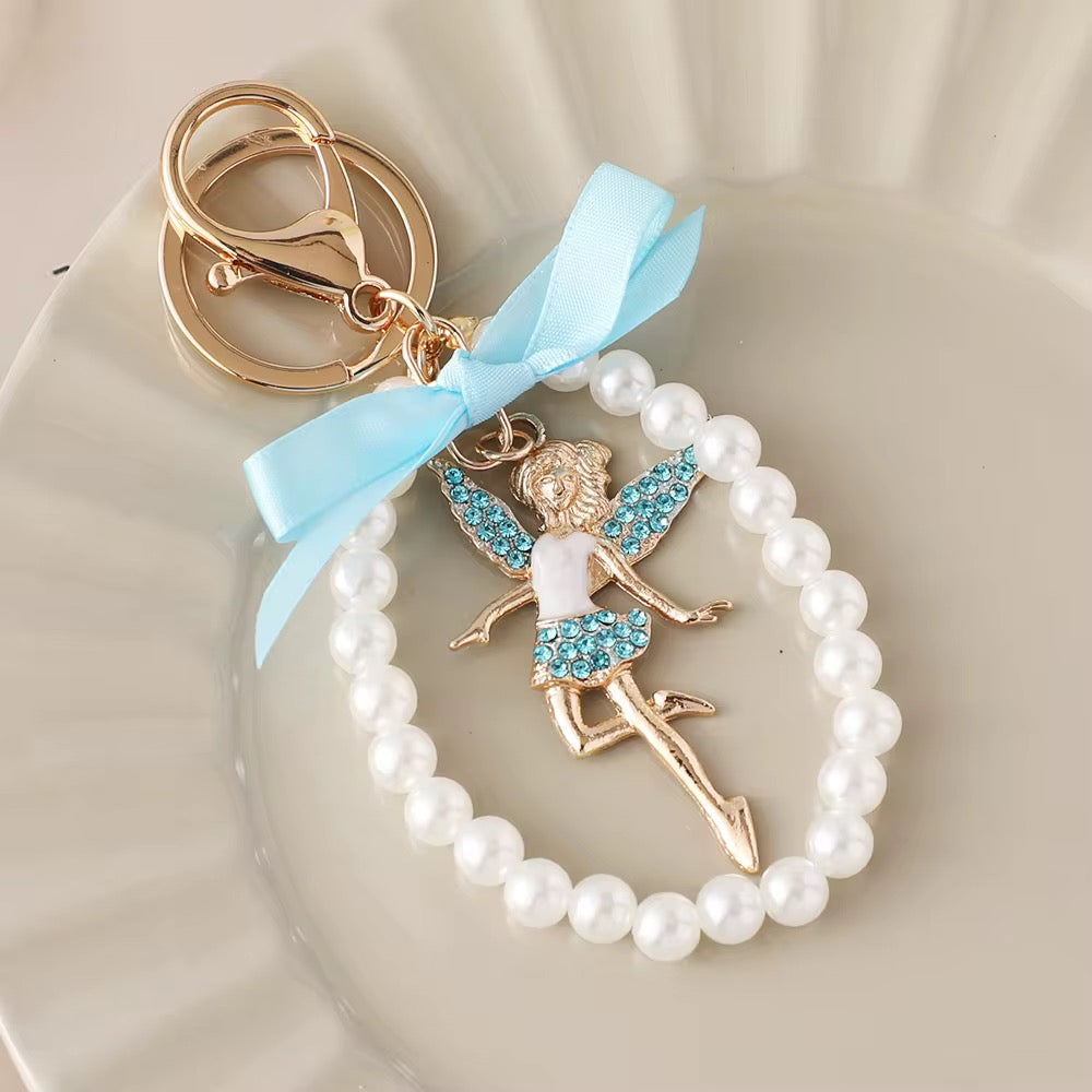 Handmade Pearl String Keychain – Winged Girl Figure Charm