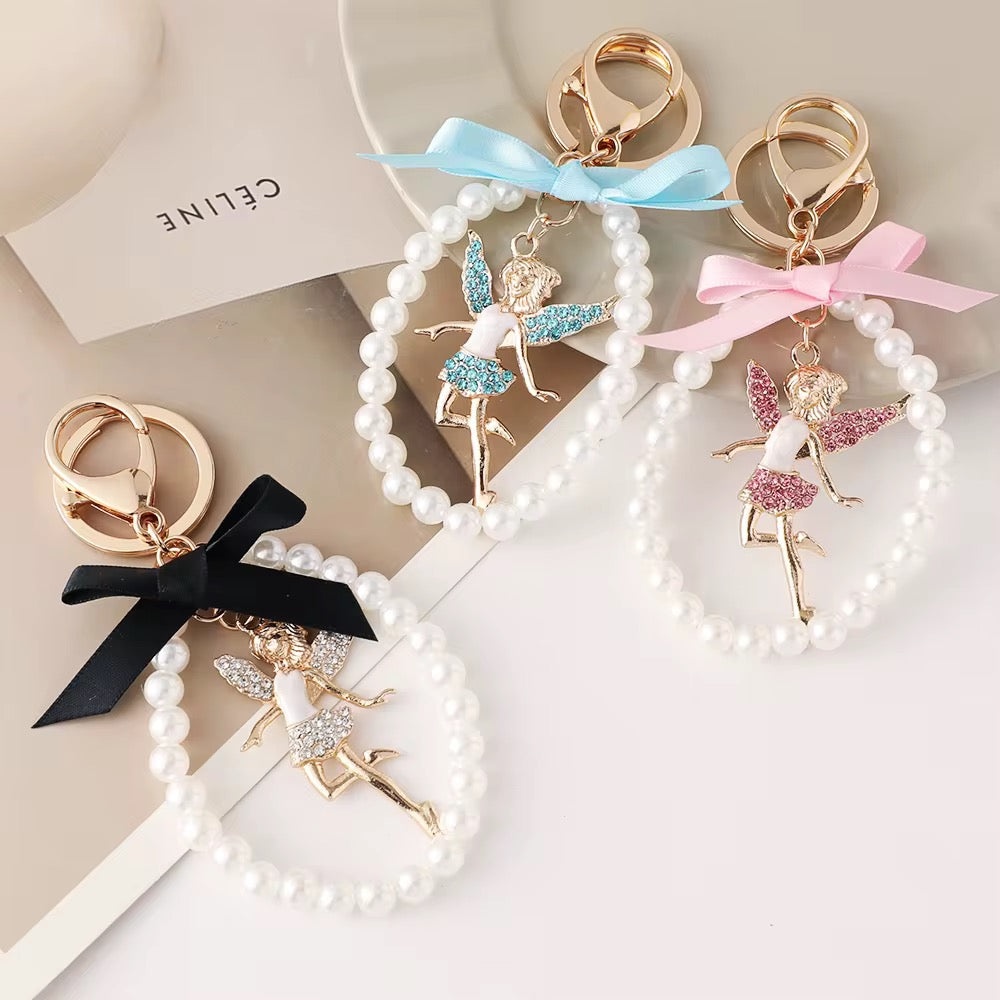 Handmade Pearl String Keychain – Winged Girl Figure Charm