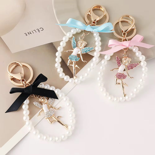 Handmade Pearl String Keychain – Winged Girl Figure Charm
